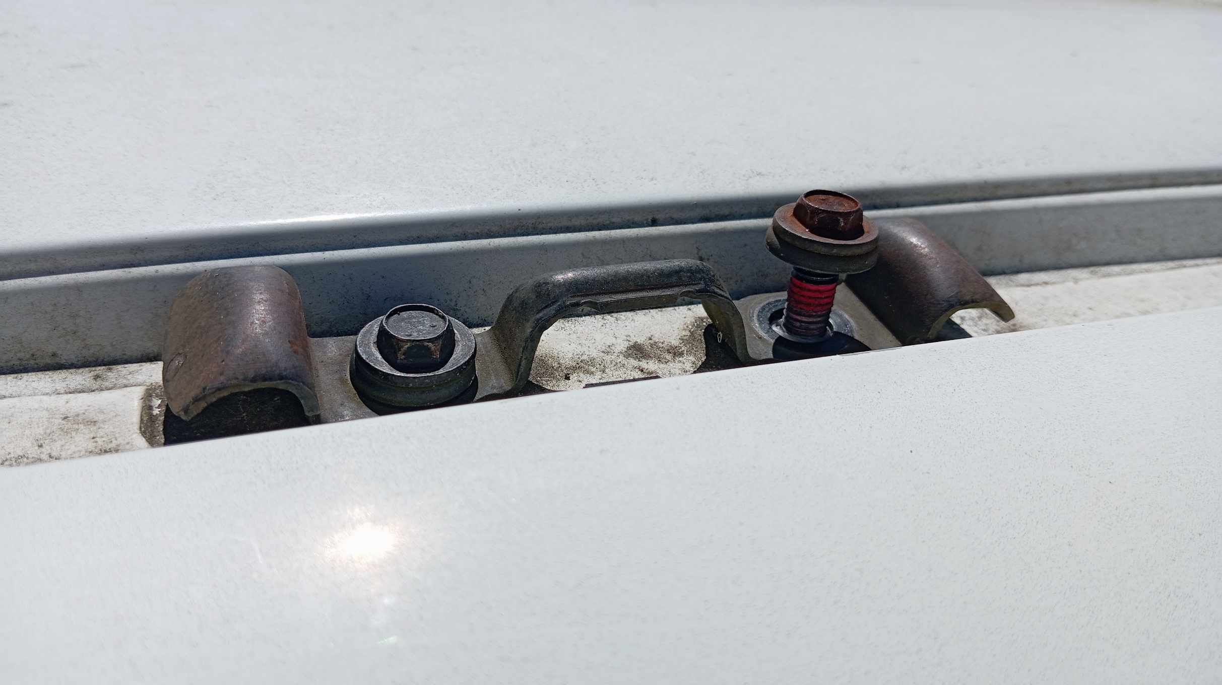 Step 2 – Remove the factory hardware